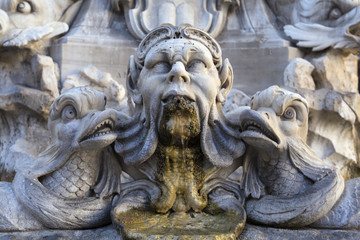 Fototapeta na wymiar Detail of Fountain of the Pantheon in Rome, Italy