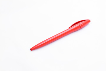red pen on a white background
