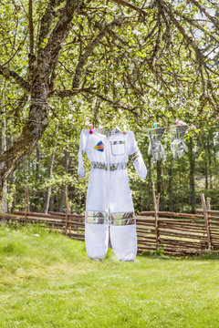 Costume handing on clothesline