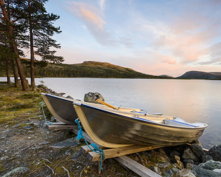 Rowing boats on coast