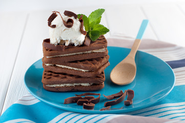 Chocolate biscuits covered with vanilla ice cream ball