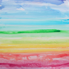 Abstract watercolor rainbow gradient background.