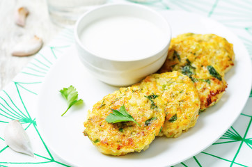 Cheesy millet zucchini fritters