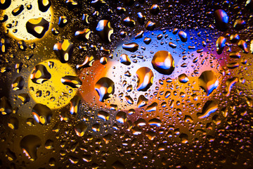 Water drops on the window at night