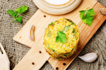 Cheesy millet zucchini fritters