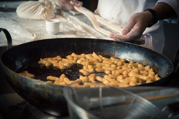 photo set of process deep fried dough stick  ' patongko '