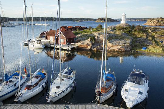 Sailing boats moored at coast