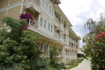 Original building and walkway with flowers