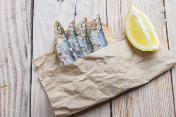 fried sardines on the plate