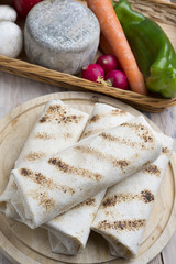 tortilla wraps with meat and vegetables