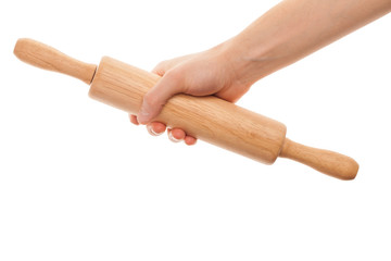 hand holding wooden rolling pin isolated on white background