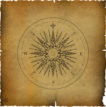 old yellowed paper with image of windrose