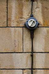 Old Electrical Switch ON OFF With Wires Stone Wall Background