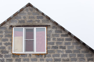 window in a new brick house