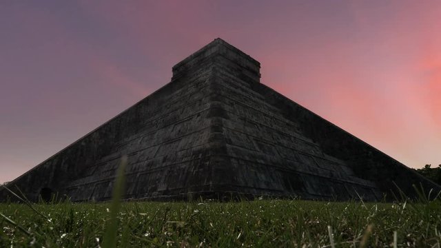 mayan site of chichen itza el castillo temple timelapse from night to day no people