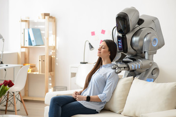 Modern robot making a massage