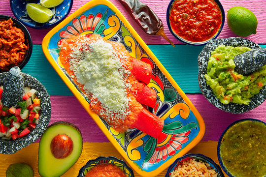 Red enchiladas Mexican food with guacamole