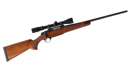 Poster Bolt action rifle with a wood stock and high-powered riflescope isolated on a white background. © Guy Sagi