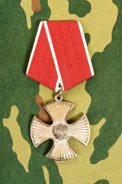 Order of bravery on the camouflage background