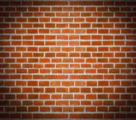 Obraz premium Ciemny odcień tła ściany z cegły.