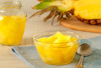 A bowl of canned pineapple on a table