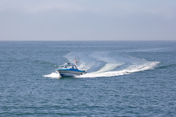 Fototapeta na wymiar Fishing boat off the California coast. California, USA.