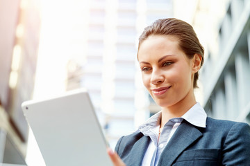 Portrait of business woman smiling outdoor