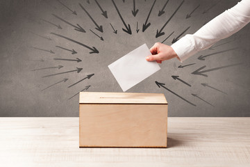 close up of a ballot box and casting vote - obrazy, fototapety, plakaty