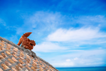 Fototapeta premium Shisa i błękitne niebo Japan Okinawa image
