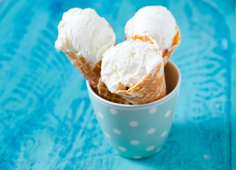 vanilla ice cream on wooden surface