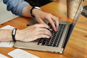 Freelancer working in coffee shop. Stock image