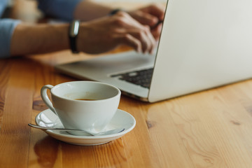 Fototapeta na wymiar Freelancer working in coffee shop. Stock image