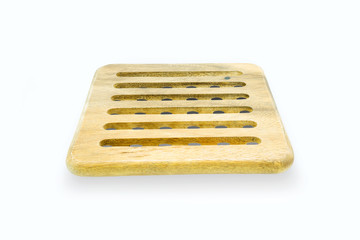 round wooden trivet isolated on white background
