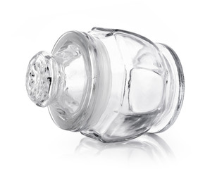 Empty glass jar isolated on a white background