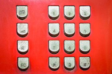 Old button number public telephone, Close up image