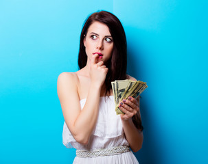 portrait of the young woman with money