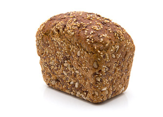 Baked rye bread with linseeds on the white isolated background