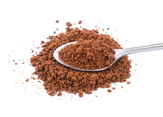 instant coffee in the spoon on white background