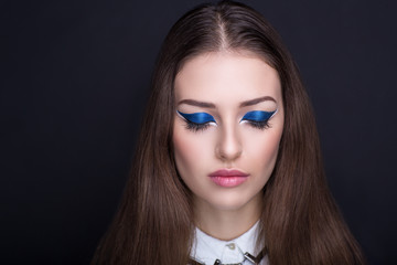 Woman with blue make up