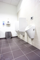 urinal on the wall
