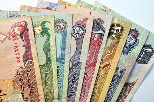 Close up different Dirhams currency note and coins, United Arab Emirates