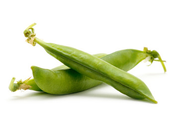 fresh green peas isolated on a white background