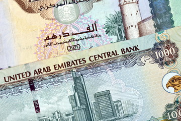 Close up different Dirhams currency note and coins, United Arab Emirates