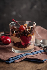 Chocolate and cherry dessert in glass