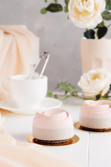 Fototapeta na wymiar Pink mousse cake with velour coating