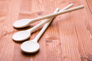 wooden spoons on wooden table