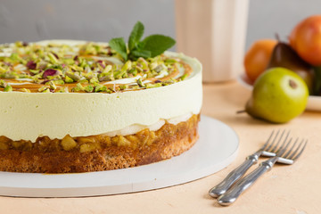 Pear and  pistachio mousse cake