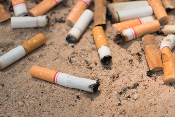 Smoking, for disposable cigarette on sand