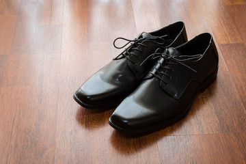 black shoes on the floor