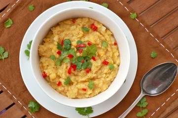 Pease pudding with coriander and chilli in the bowl